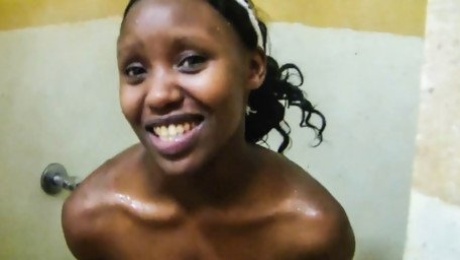 Ebony babe smiles before hardcore pounding in hotel bathroom