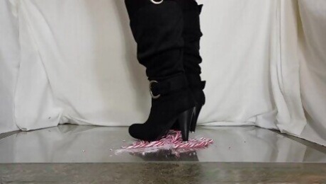 Girlfriend crushes candycane in metal tipped boots